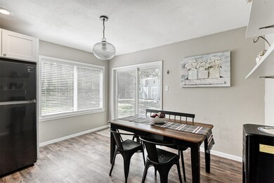 Lots of natural light while you enjoy meals in your new home. Brand new sliding glass doors with built-in blinds leading to your backyard!