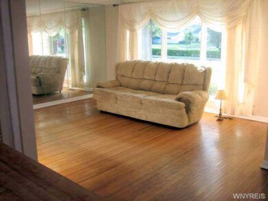 Living Room. On wall mirrored.  Could be removed.