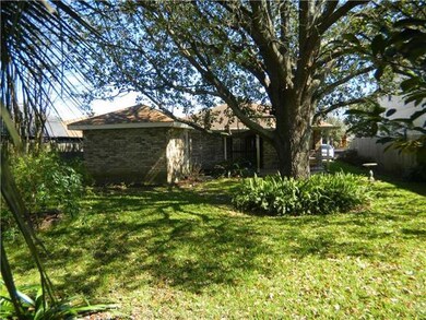 Backyard. REAR YARD HAS WONDERFUL OAK SHADE TREE A