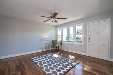 Bright Living room w/ new C-fan, refinished hardwoods & New paint