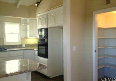 Another Kitchen photo showing thebreakfast bar and