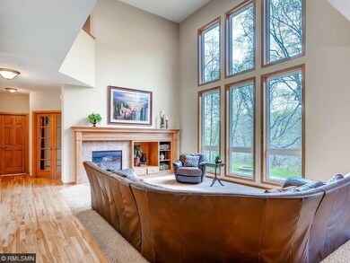 Family/great room featuring floor to ceiling windo