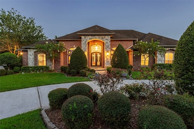 Gorgeous double front doors will welcome your gues