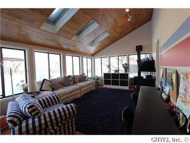 Rec room. This room surrounded by windows overlook