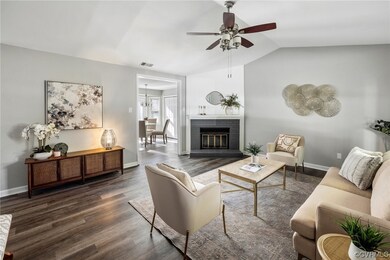 Brick fireplace, LVP, ceiling fan