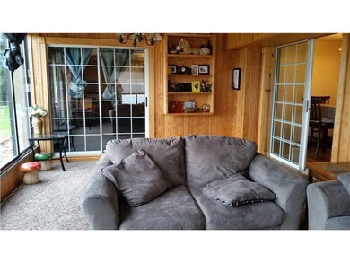 Family Room. Enclosed Family room with built ins! 