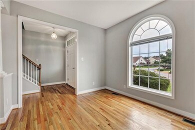 Living Room as viewed while looking towards Foyer