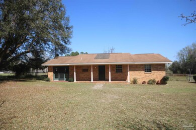a 11 x26.6 Den w/ washer & dryer area by back door