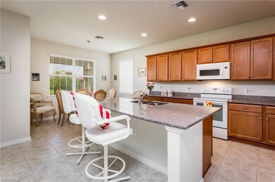 Kitchen with an island for gathering friends and f