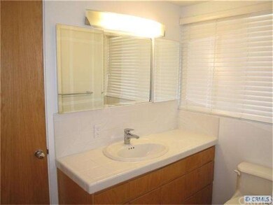 Updated master bath near entry with tiled shower s