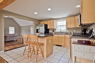 Main house - kitchen has island,...