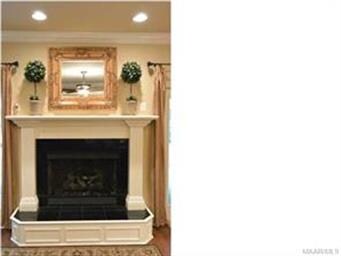 BEAUTIFUL FIREPLACE WITH CUSTOM MANTLE AND HEARTH.