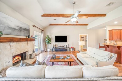 Open concept with handscraped hardwood floors and