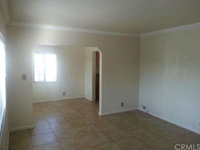 Formal livingroom with formal dining room; crown m