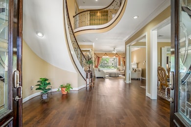 Impressive double glass leaded doors lead into a l
