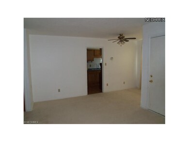 From living room to dining area and kitchen
