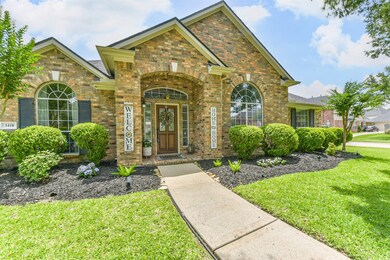 Brick on all sides with a covered entryway.