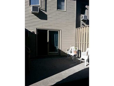 Exterior Back. SLIDERS TO PRIVATE PATIO