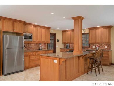 Kitchen. The island is the centerpiece! Door leads