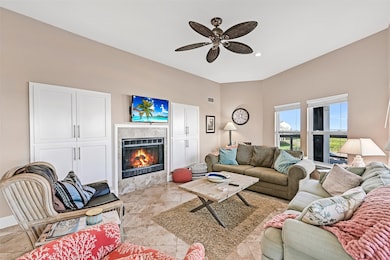 Cozy living room with all windows aimed at the bea