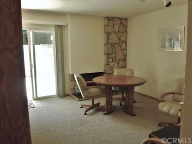 Family Room, Dining Room with Fireplace opens to b