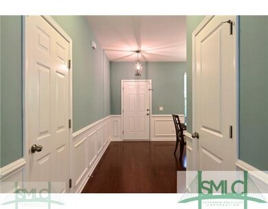 Foyer. Foyer Offers Access to Formal Dining Room..