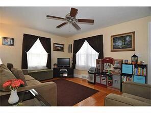 Living Room. lovely hardwood floors, large windows