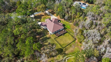 Expansive property, surrounded by woods with plenty of cleared space