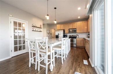 Granite countertops with white subway tile backsplash