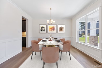 Photo includes virtual staging. The formal dining