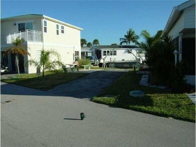 Exterior Front. WATERFRONT LOT ON PORPOISE ISLAND