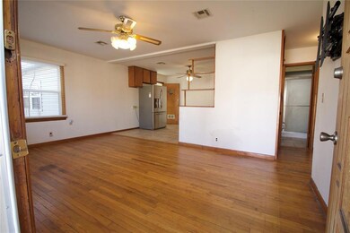 Unfurnished living room with light hardwood / wood