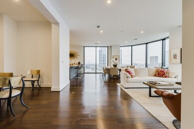 Grand space with formal dining on the left.