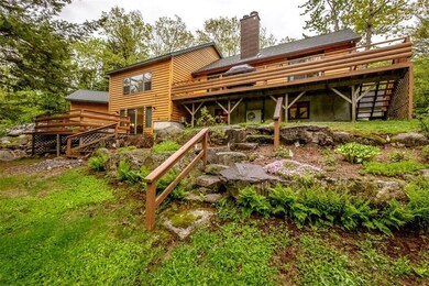 Rear shot of the house showing 2 big...