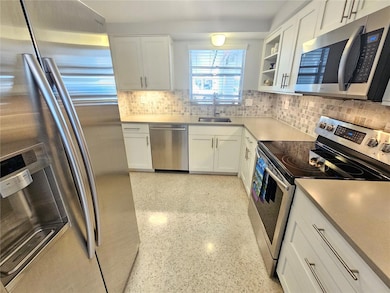 Updated kitchen with stainless appliances