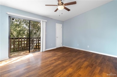 Main bedroom with balcony facing the mature tree and picnic area