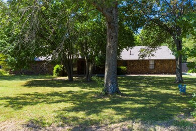 Lovely shade trees spread out over the acre