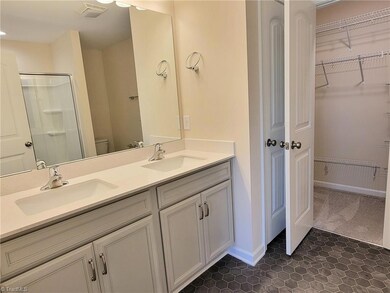 Example: Primary Bathroom. **Cabinet color and flooring different than photo**