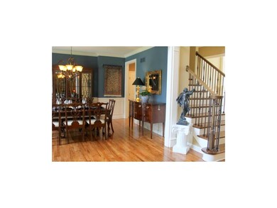 Warmth abounds in this lovely formal dining room w