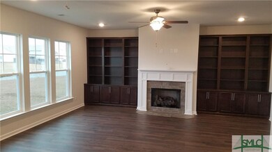 Living Room with Fireplace and Built Ins