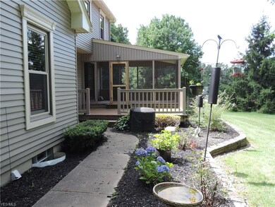 Back walkway to porches. Lovely, quiet backyard.