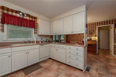 Kitchen has plenty of drawers and cabinets.