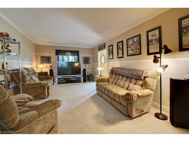 Located right off the foyer is this family room wi