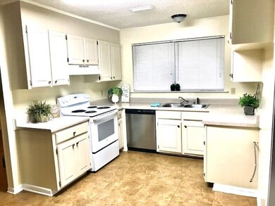 Kitchen w Breakfast area and Dining room