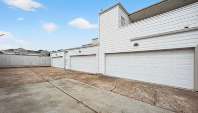 Rear Garage Access – Spacious rear entry with attached two-car garage.

