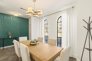 Dining space featuring an inviting chandelier