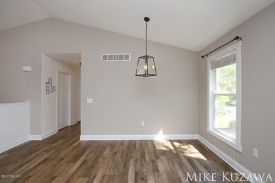 329 N Jefferson St, Lowell, MI 49331 - photo 4