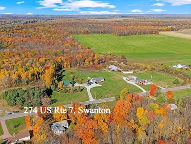 Private lot bordered by maples