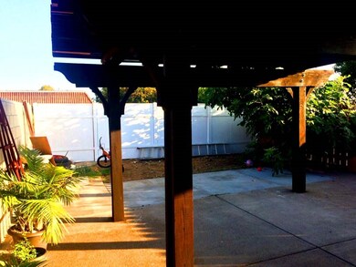 YARD HAS A BIG PATIO. THERE IS ALSO A LARGE  SEPAR