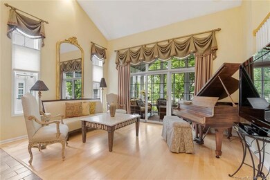 Living room with sliders to enclosed porch